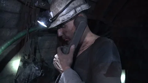 The mine worker reports on the work of the service connection 스톡 동영상 94662316