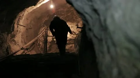 Miner ascending in mine Stock Footage