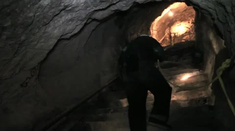 Miner ascending stairs Stock Footage 10908737