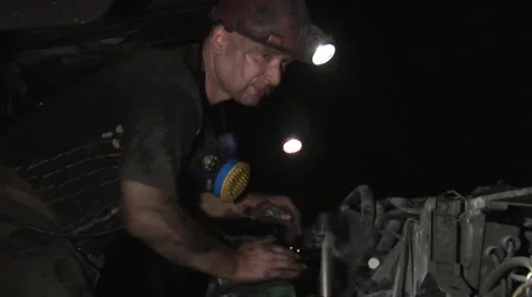 Miner is Engaged in Mining of Black Coal in Mine of Donetsk Stock Footage 53502666