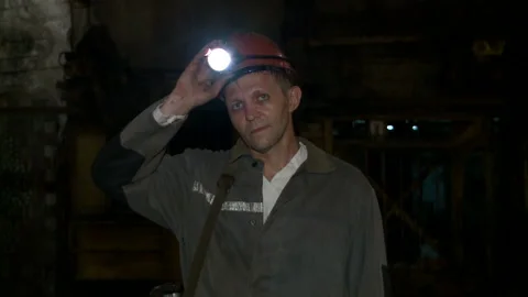 Miner looks at the camera before going down to the mine Stock Footage 132433514