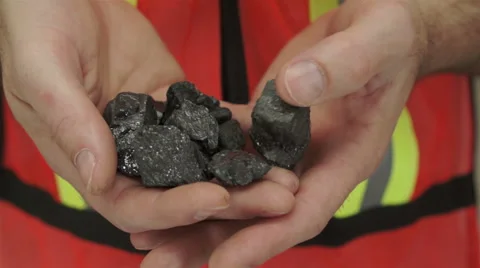 Miner Shows Carbon Graphite Ore 動画素材 45021591