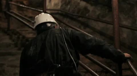 Miner on stairs Stock Footage 10723240