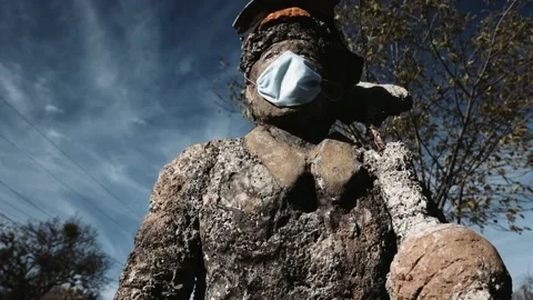 Miner statue wearing a facemask Stock Footage 157738791