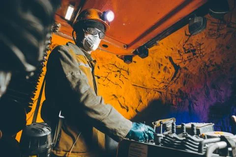 Miner underground mining gold Stock Photos