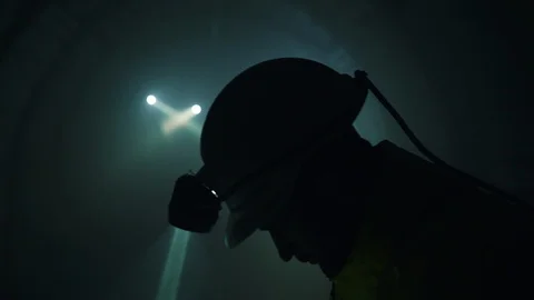 Miner works with a drill Stock Footage 121178584