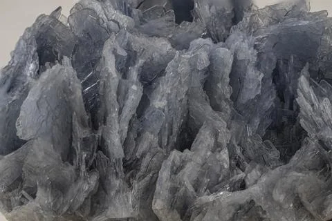 Mineral sample of barite on a light background Foto stock