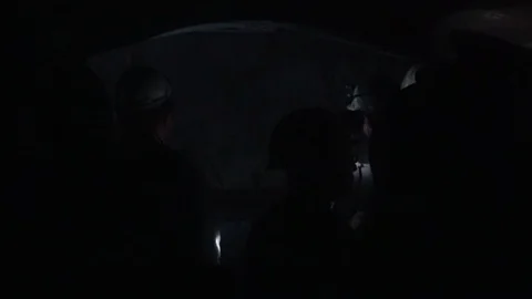 Miners climb out of the mine in an elevator cage 스톡 동영상 94202113