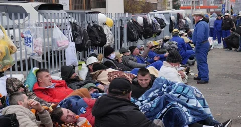 Miners protesting on the street during winter Video stock 170013052