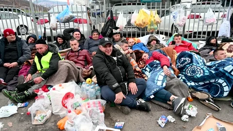 Miners protesting on the street. Protesting miners. Protesters sleep on street Stock Footage 165787040