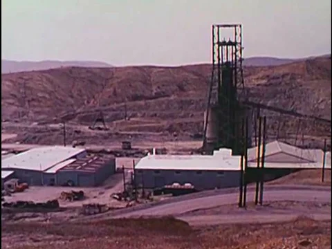 Miners take an elevator down to a mine, and undergo safety procedures in the Stock Footage 74936303