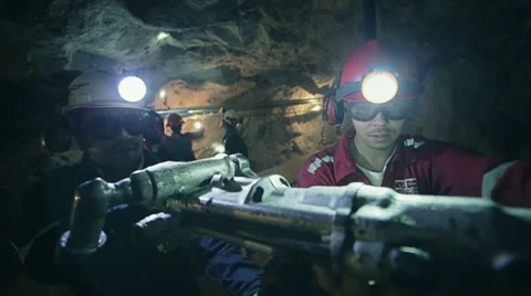 Miners using pneumatic drill Stock Footage 32970682