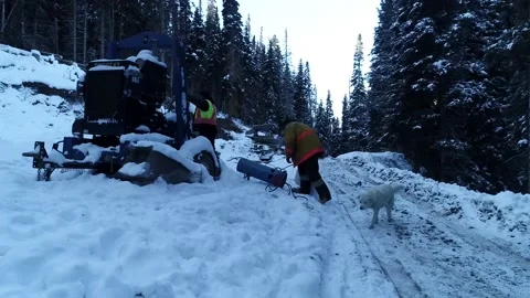 Miners Work on Frozen Pump in Winter Drone Shot Stock Footage 146554391