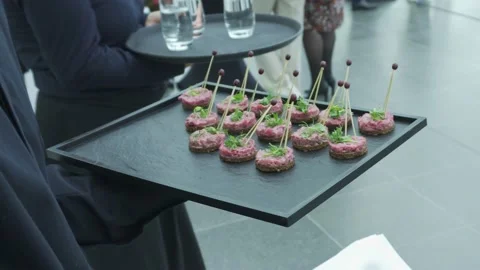Mini appetizers on the black tray Stock Footage 224315147