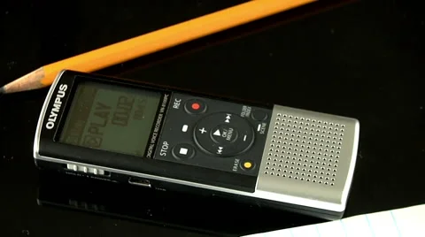 Mini auto digital reocorder criminal confession police interrogation rotating Stockbeeldmateriaal 49547030