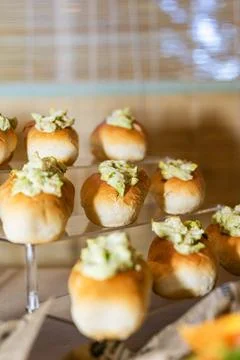 Mini bread buns with avocado spread appetizer Stock Photos