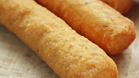 Mini bread sticks presentation macro close up presentation slowly rotating .. Stock Footage 344690013