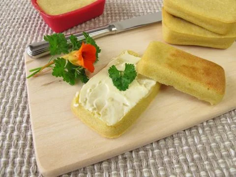 Mini-breads from maize flour with butter Stock Photos