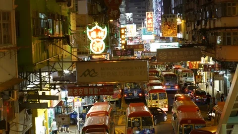 Mini buses in Neon-lighted Mong Kok, Hong Kong Stock Footage 101735229
