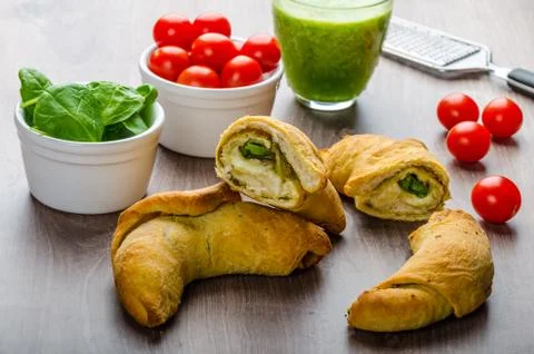 Mini calzone roll with herbs and cheese Stock Photos