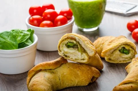 Mini calzone roll with herbs and cheese Stock Photos