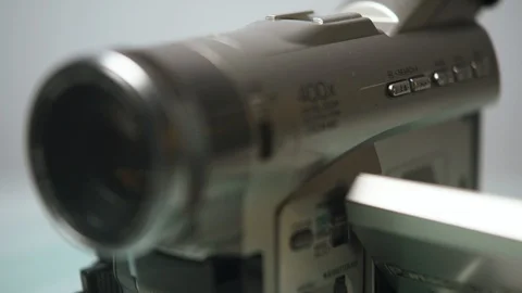 Mini camcorder mini dv vhs camera, rack focus close up shot Stock Footage 111679894