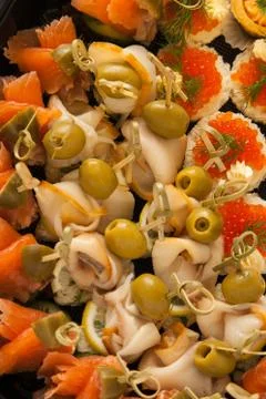 Mini canape with different fish Stock Photos