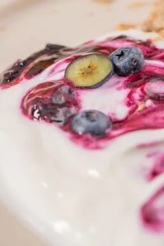 Mini cheesecake with blueberry compote macro view Stock Photos