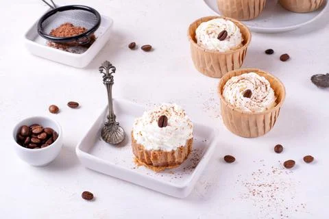 Mini cheesecake with cappuccino taste topped with whipped cream 写真素材