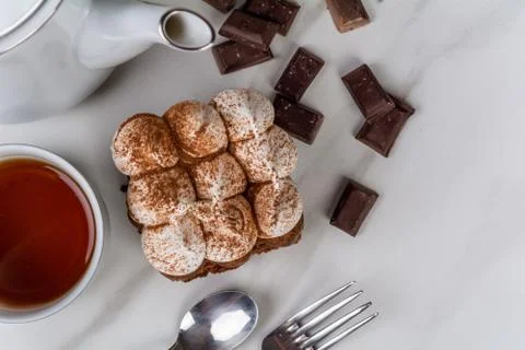 Mini chocolate cake with a cup of tea. Stock Photos