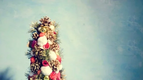 Mini Christmas tree on blue decorative background Stock Footage 82756181