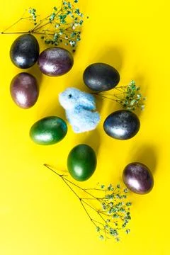 Mini composition of Easter holiday. painted colored eggs, bunny toy and twi.. Stock Photos