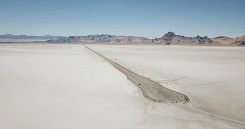 Mini Cooper Exploring Salt Flats Stock Footage 104581708
