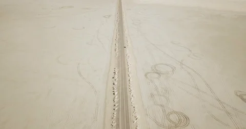 Mini Cooper Exploring Salt Flats Stock Footage 104584264