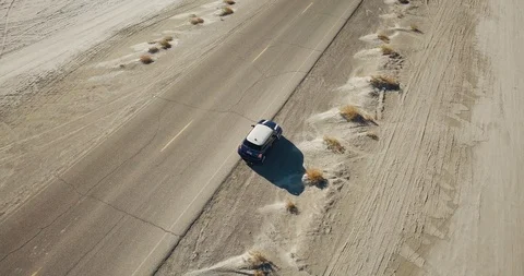 Mini Cooper Exploring Salt Flats Video stock 104584273