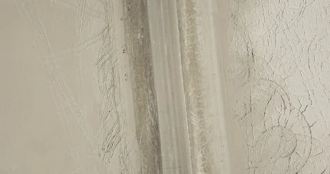 Mini Cooper Exploring Salt Flats Stock Footage 104690795