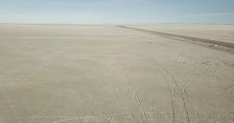 Mini Cooper Exploring Salt Flats Stock Footage 104720151