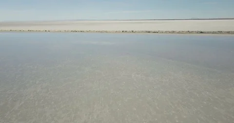 Mini Cooper Exploring Salt Flats Stock Footage 104720199