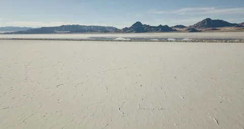 Mini Cooper Exploring Salt Flats Stock Footage 104720200