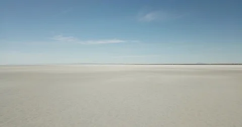 Mini Cooper Exploring Salt Flats Stock Footage 104720205
