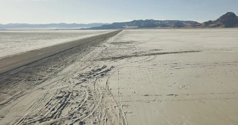 Mini Cooper Exploring Salt Flats Stock Footage 104720231