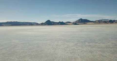 Mini Cooper Exploring Salt Flats Stock Footage 104720250