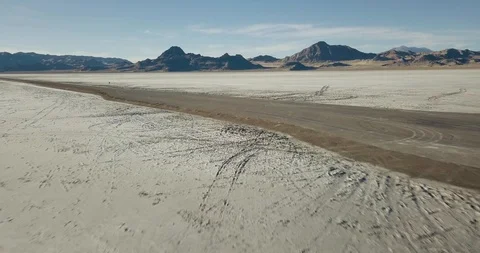 Mini Cooper Exploring Salt Flats Stock Footage 104720345