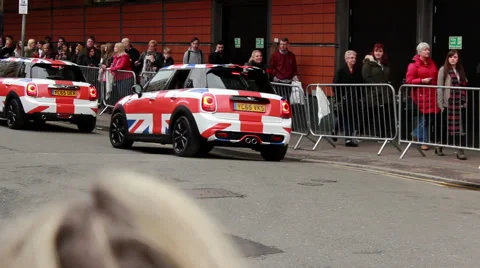 Mini Cooper parade and big queue of people Video stock 60423862