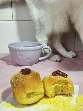 Mini cornbread with coffee and cat. Stock Photos