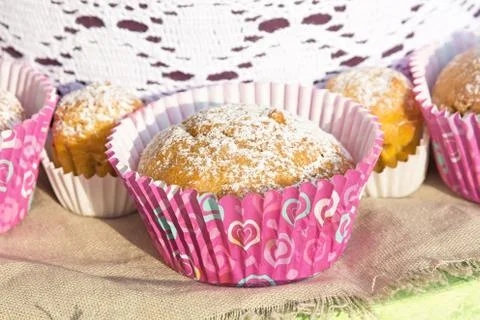Mini cupcakes in colorful wrapper. Stock Photos