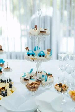 Mini cupcakes on a multi level tier in different colors. cute and colorful yu Stock Photos