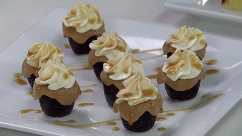 Mini dark and milk chocolate cupcake desserts Stock Footage 102137449