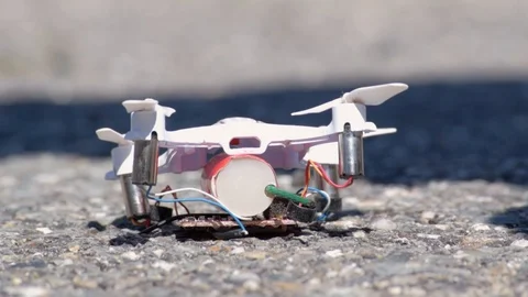 A mini drone exploding from a firecracker. Stock Footage 92322943
