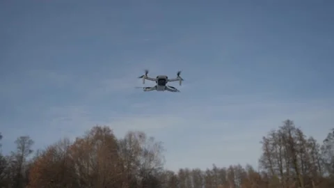 Mini drone is flying in the air Stock Footage 237114937